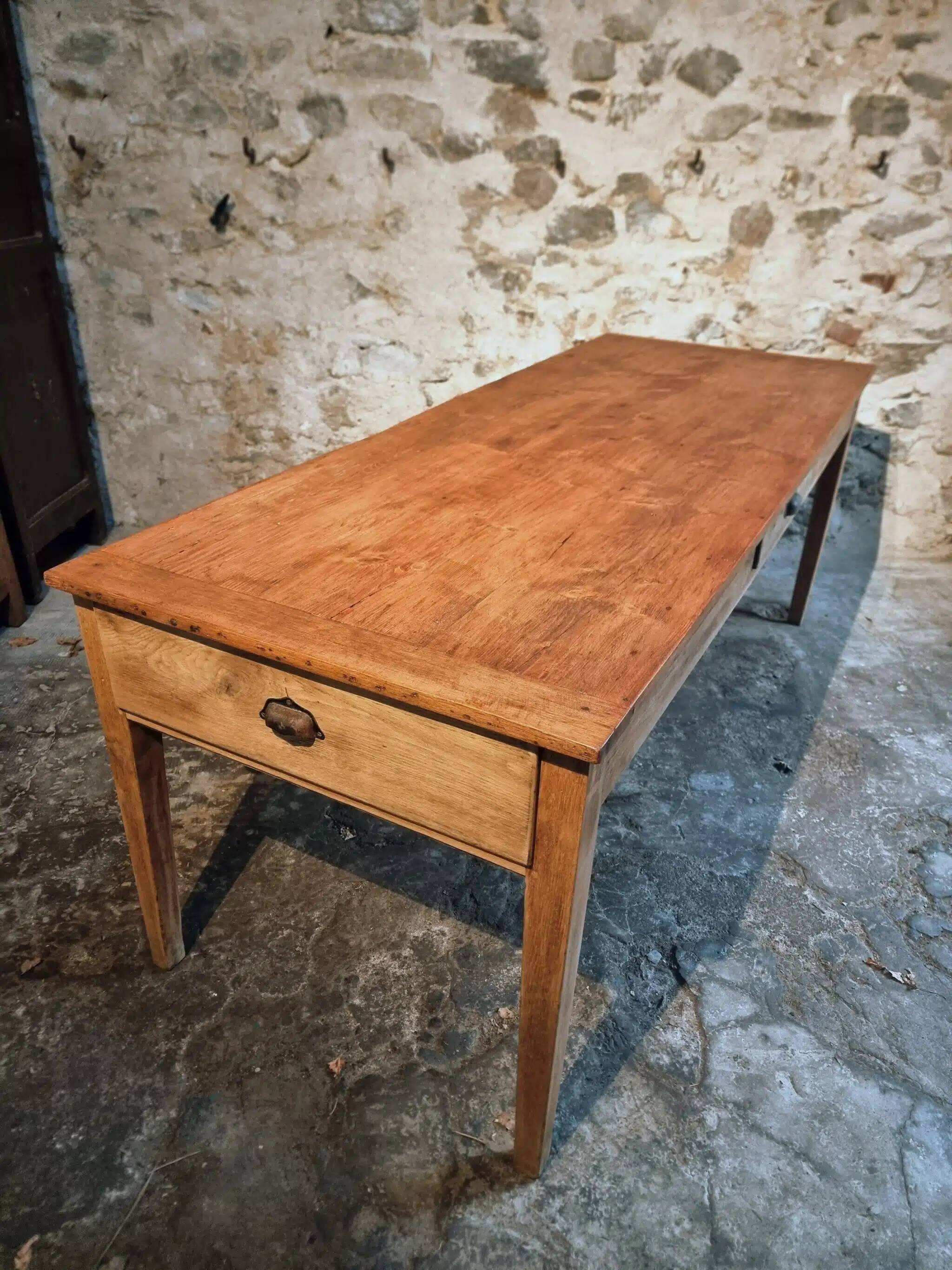 Antique French farmhouse dining table in oak and pine, circa 1900