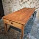 Antique French farmhouse dining table in oak and pine, circa 1900