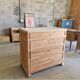 Walnut chest of drawers with white marble.