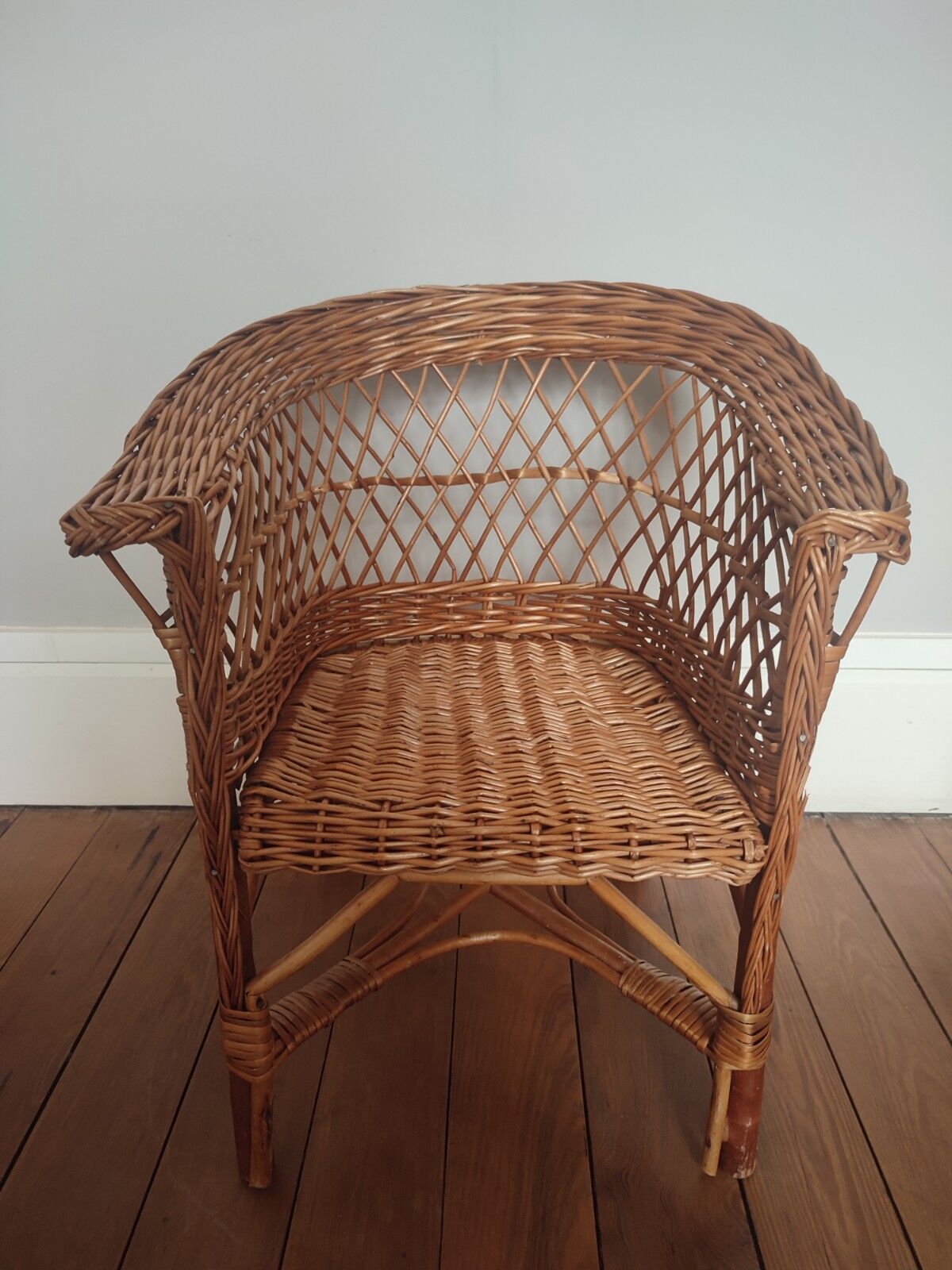 Vintage wicker children's armchair