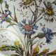 Antique Longchamp shallow dish with polychrome daisies in ironstone.