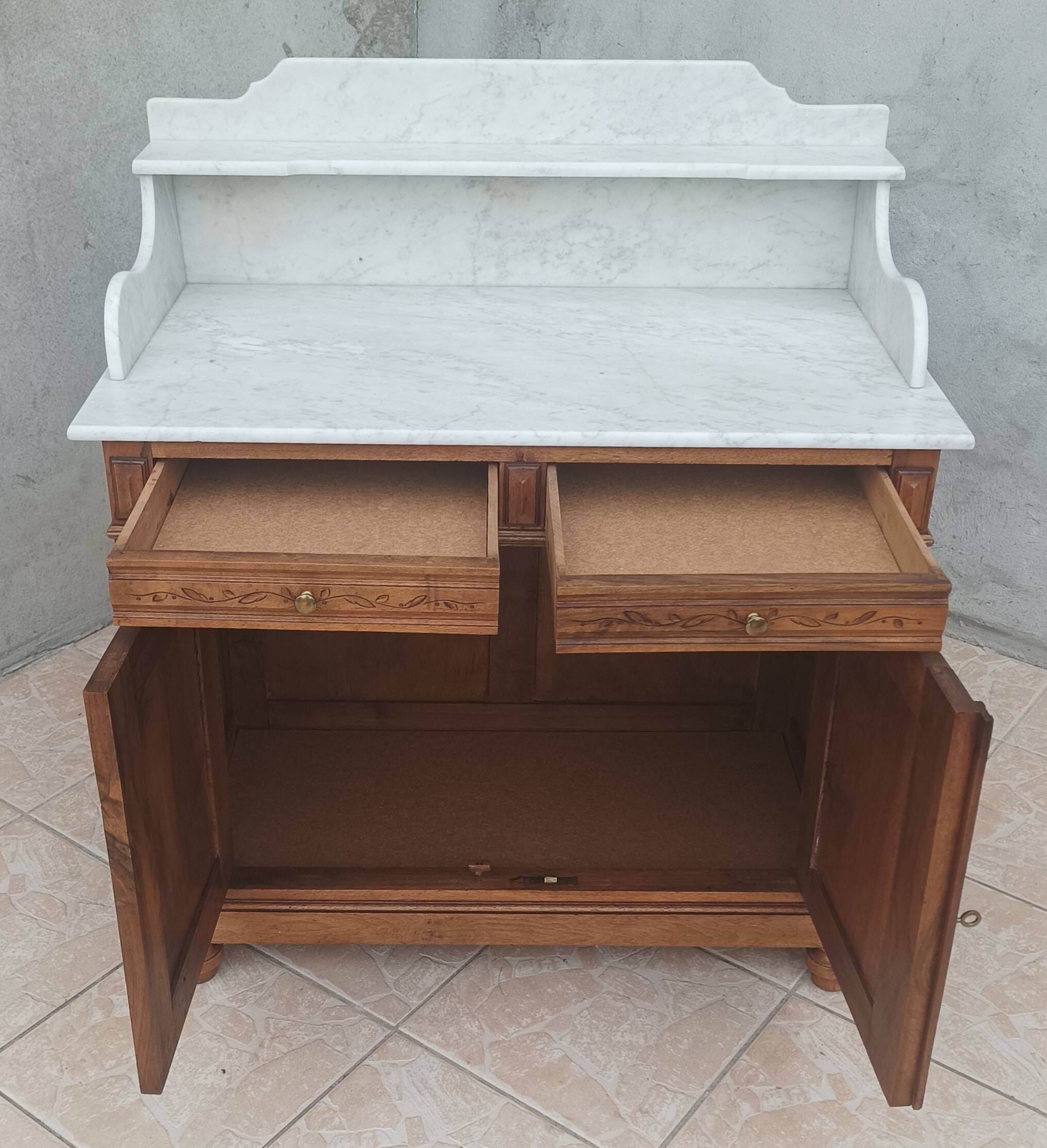 Antique walnut and white marble bathroom cabinet