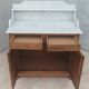 Antique walnut and white marble bathroom cabinet