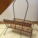 Wearing vintage rattan and black iron design magazines of the 1960s.