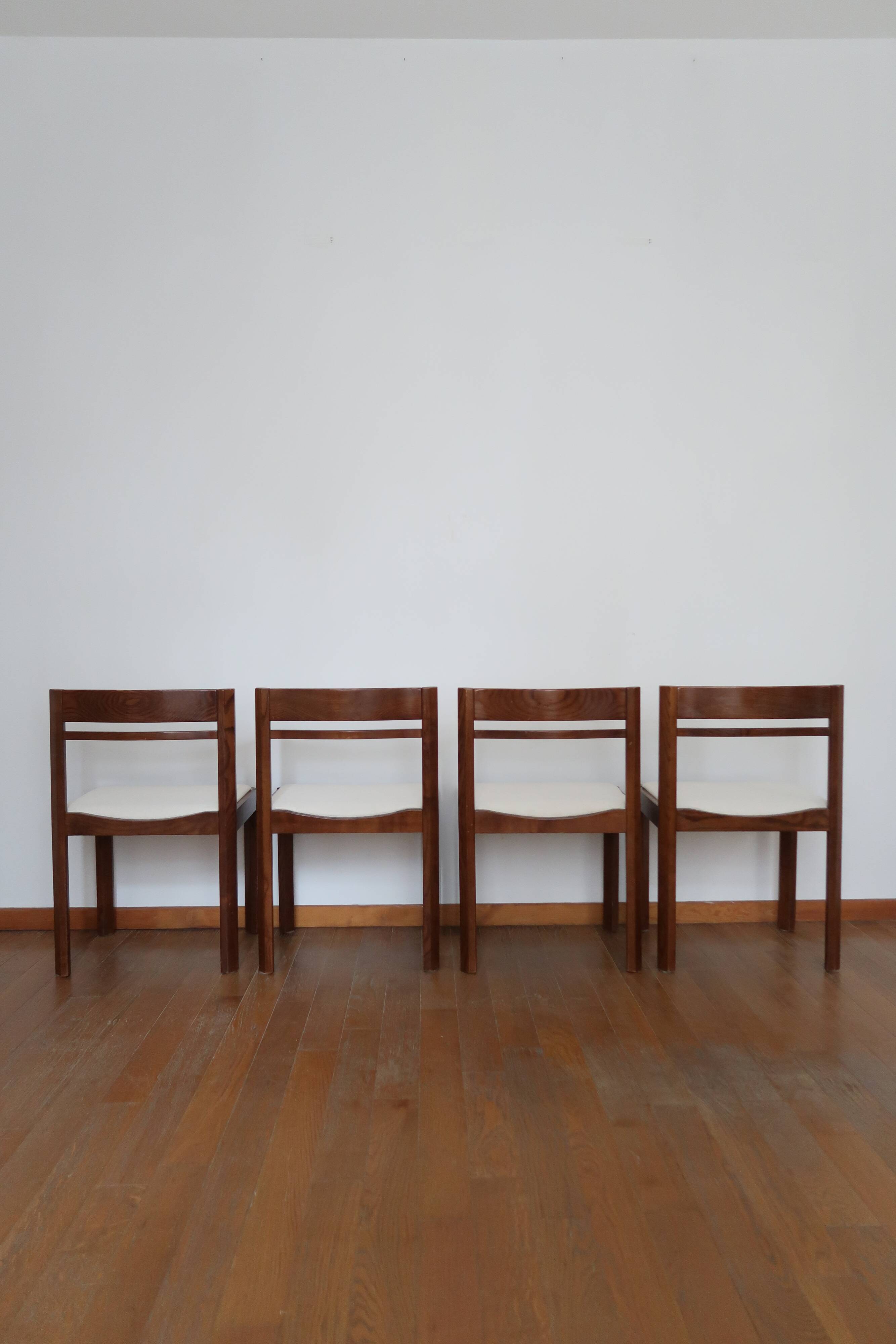4 modernist cream chairs