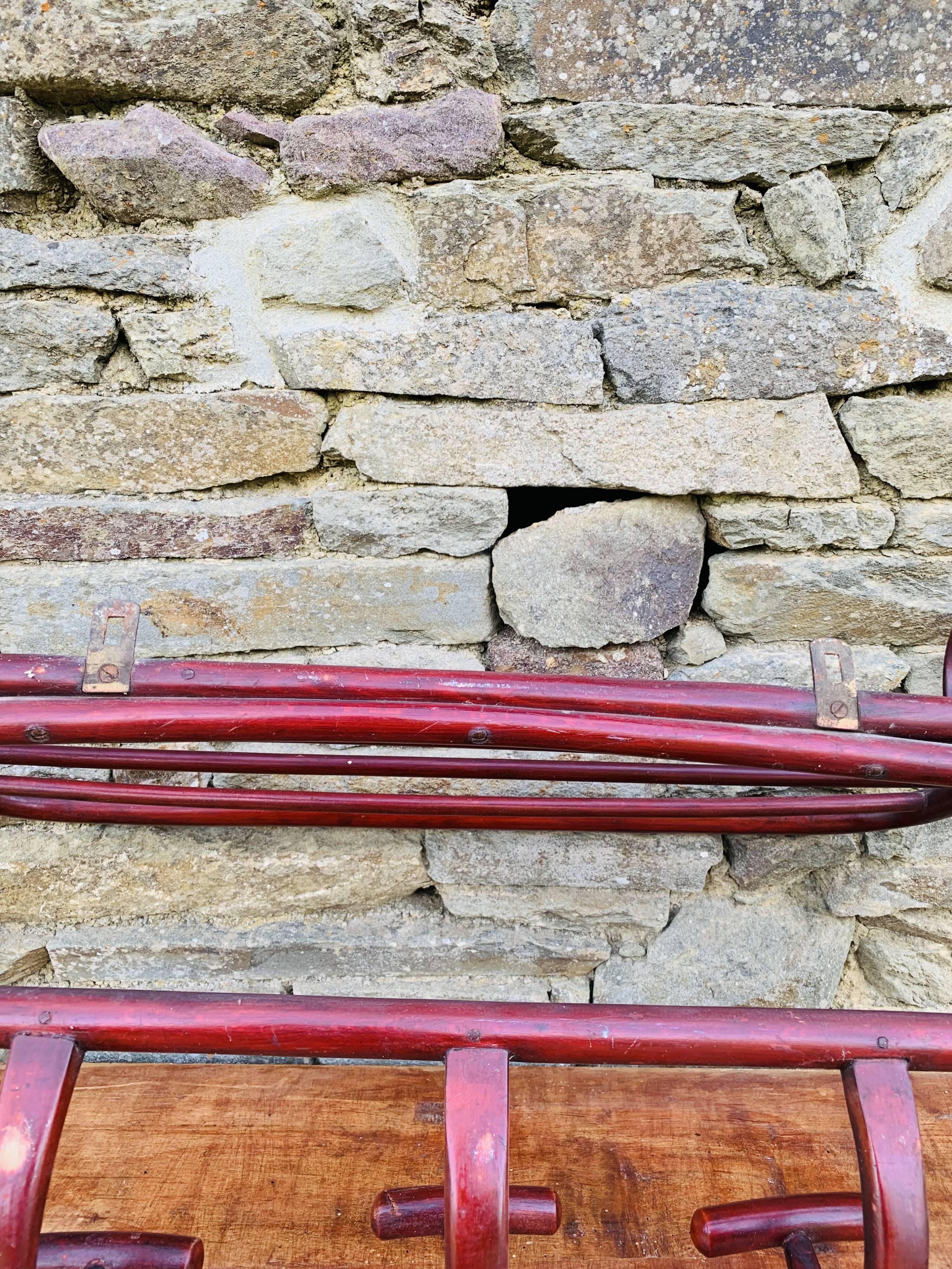 Antique curved wooden wall coat rack