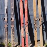 3 pairs of old skis