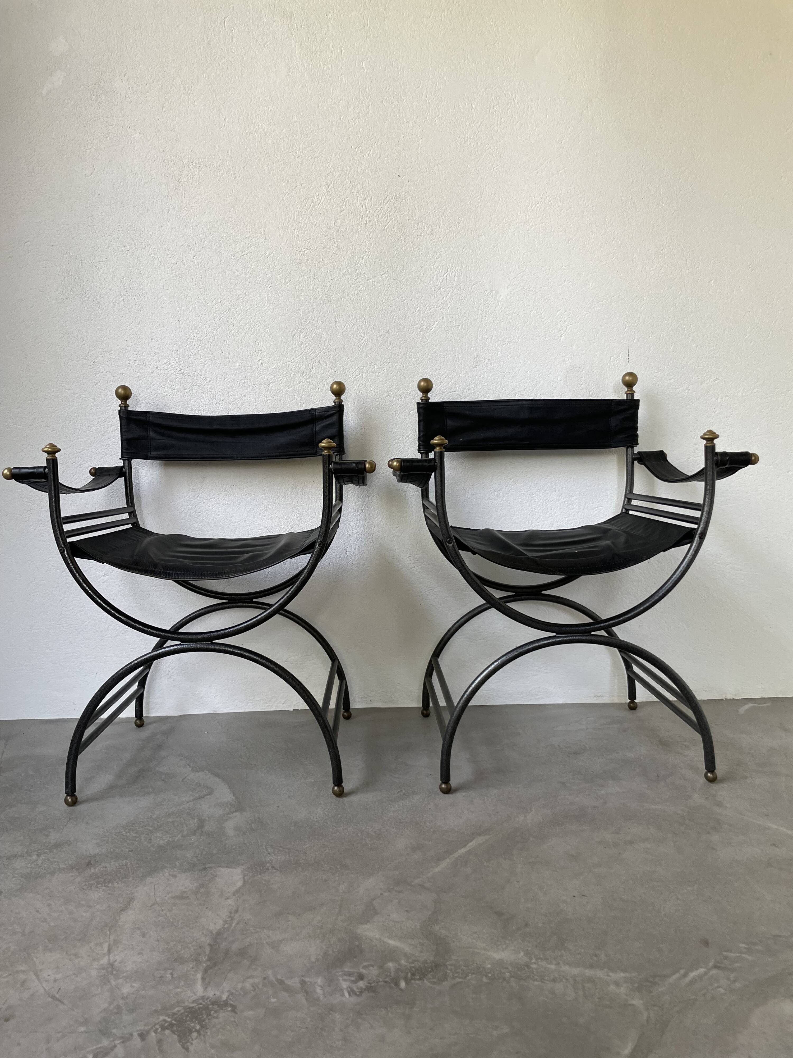 Pair of leather “curule” emperor armchairs