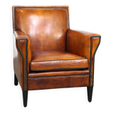 Sleek sheepskin Art Deco design armchair with beautiful details