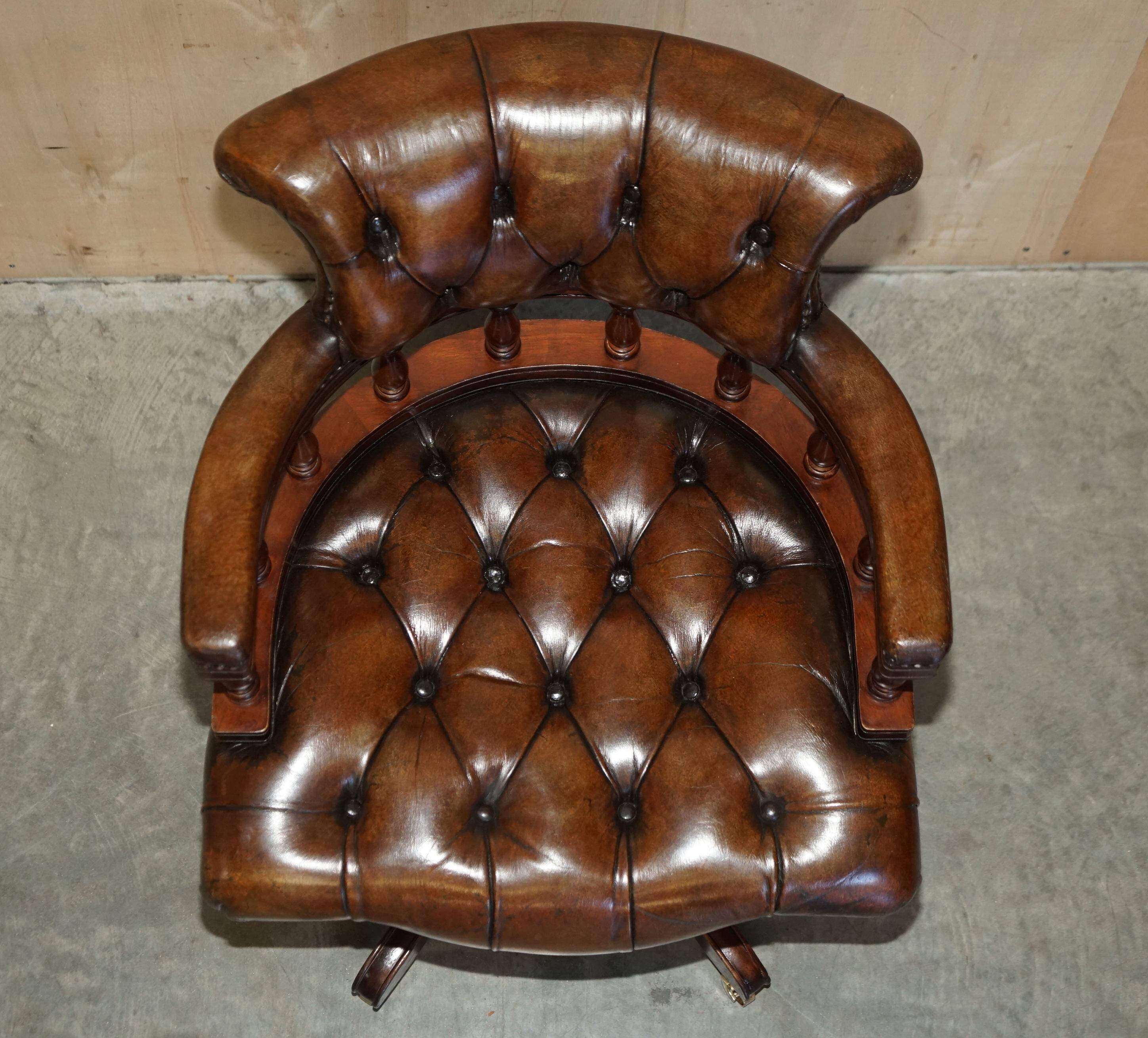 Vintage Chesterfield captain's chair in leather