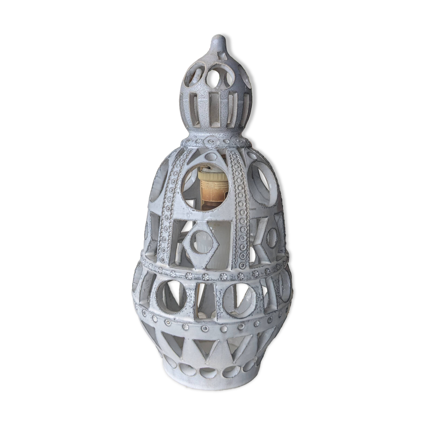 Ceramic lamp with cut-out design in the style of Roger Collet, 1960s.