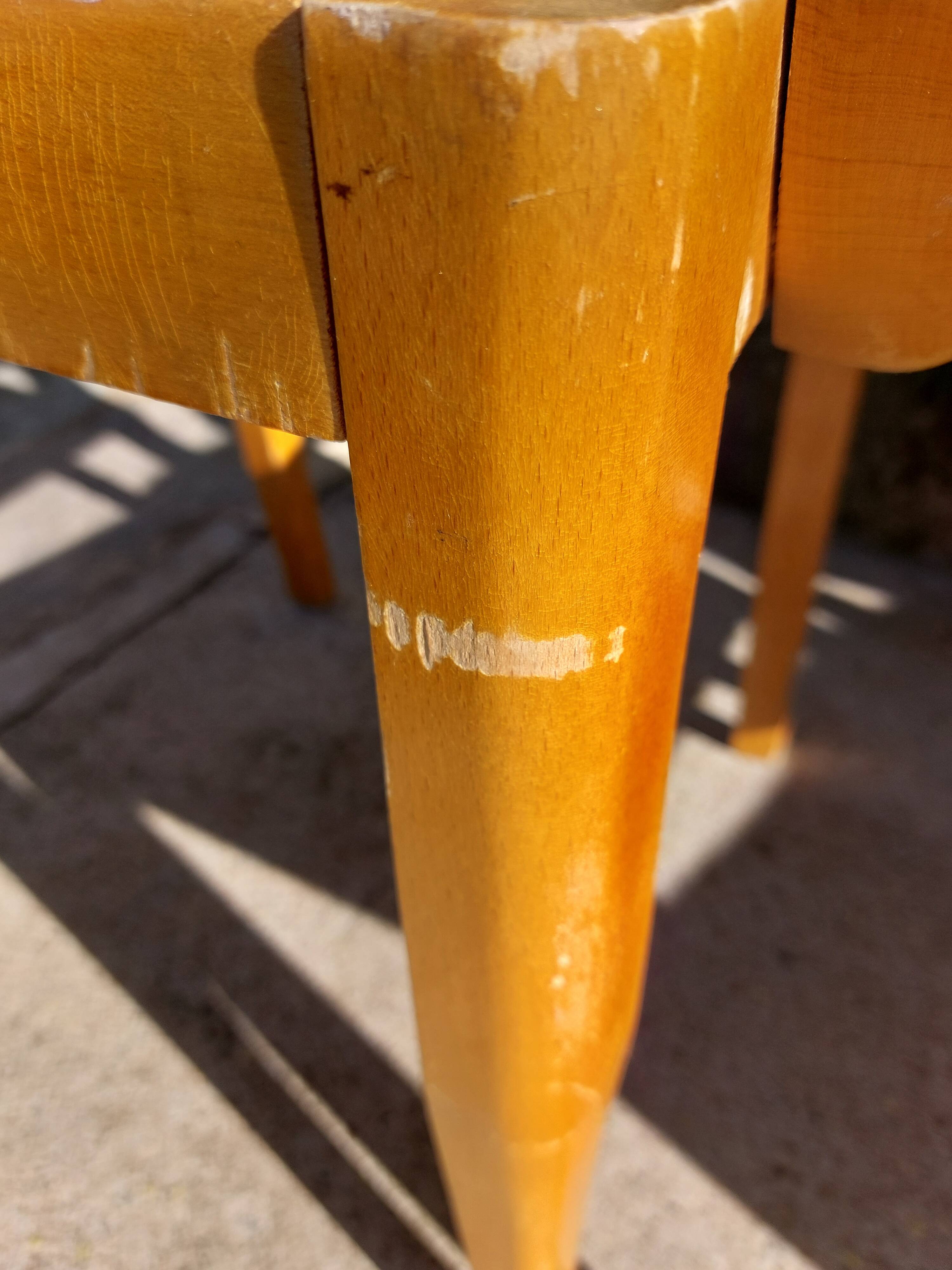 3 vintage bridge chairs with rounded armrests.