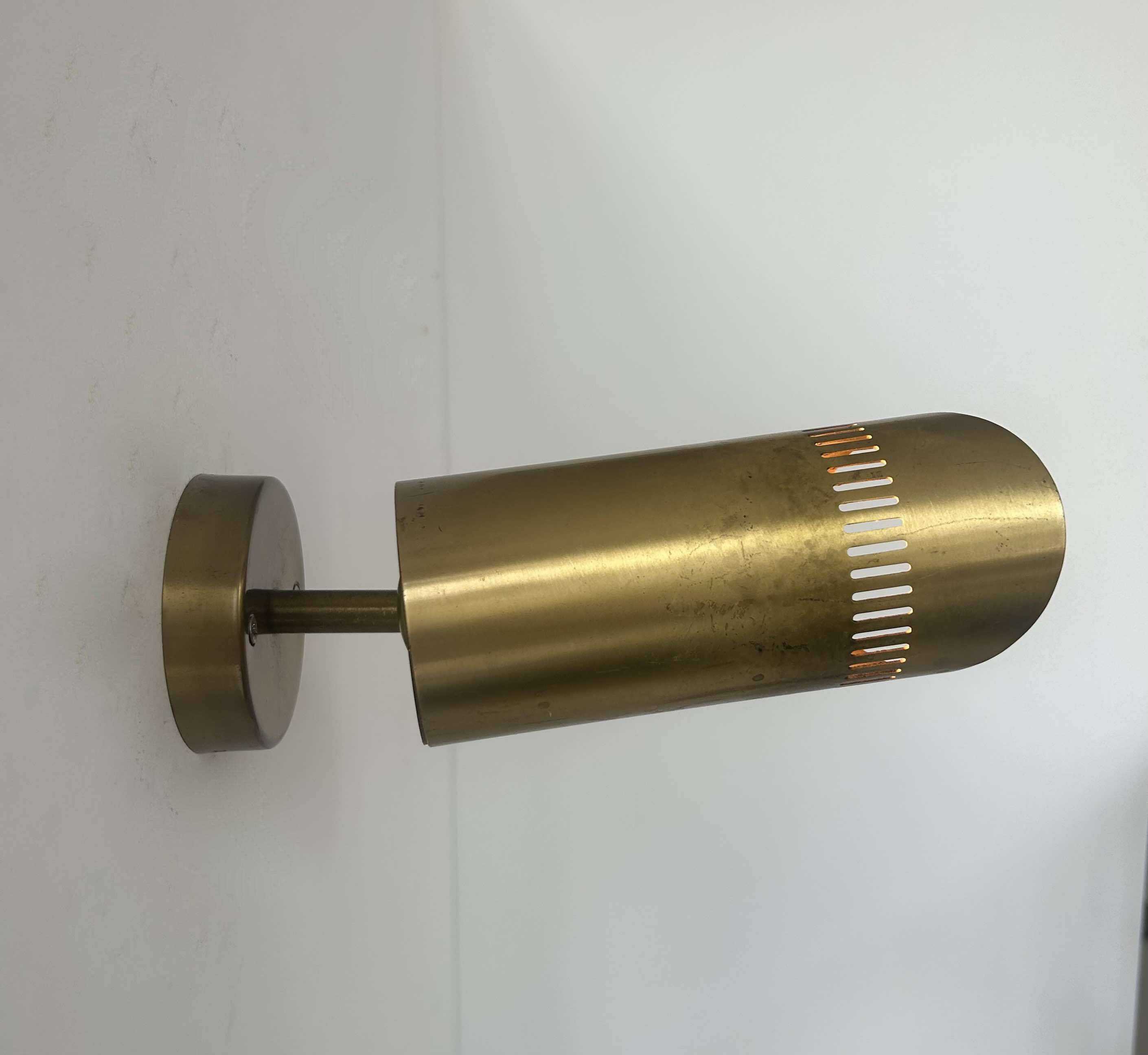 Vintage adjustable wall light, solid perforated brass, France 1960