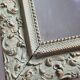 MIroir ancien de style Louis XV en stuc et bois patiné 58x43 cm