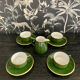 Set of 4 cups and their saucers and milk jug
