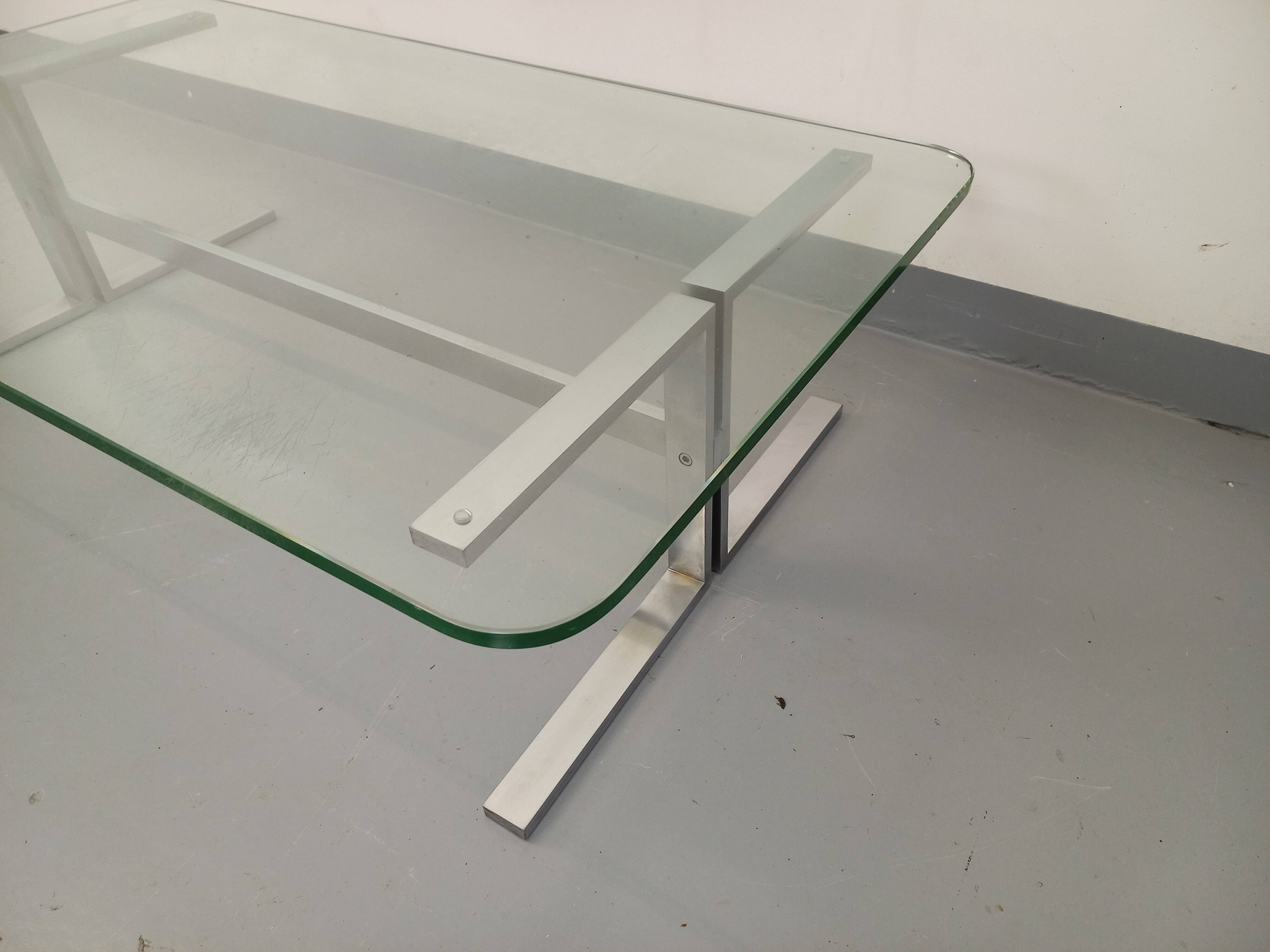 Vintage coffee table in transparent glass and cast aluminum from the 70s