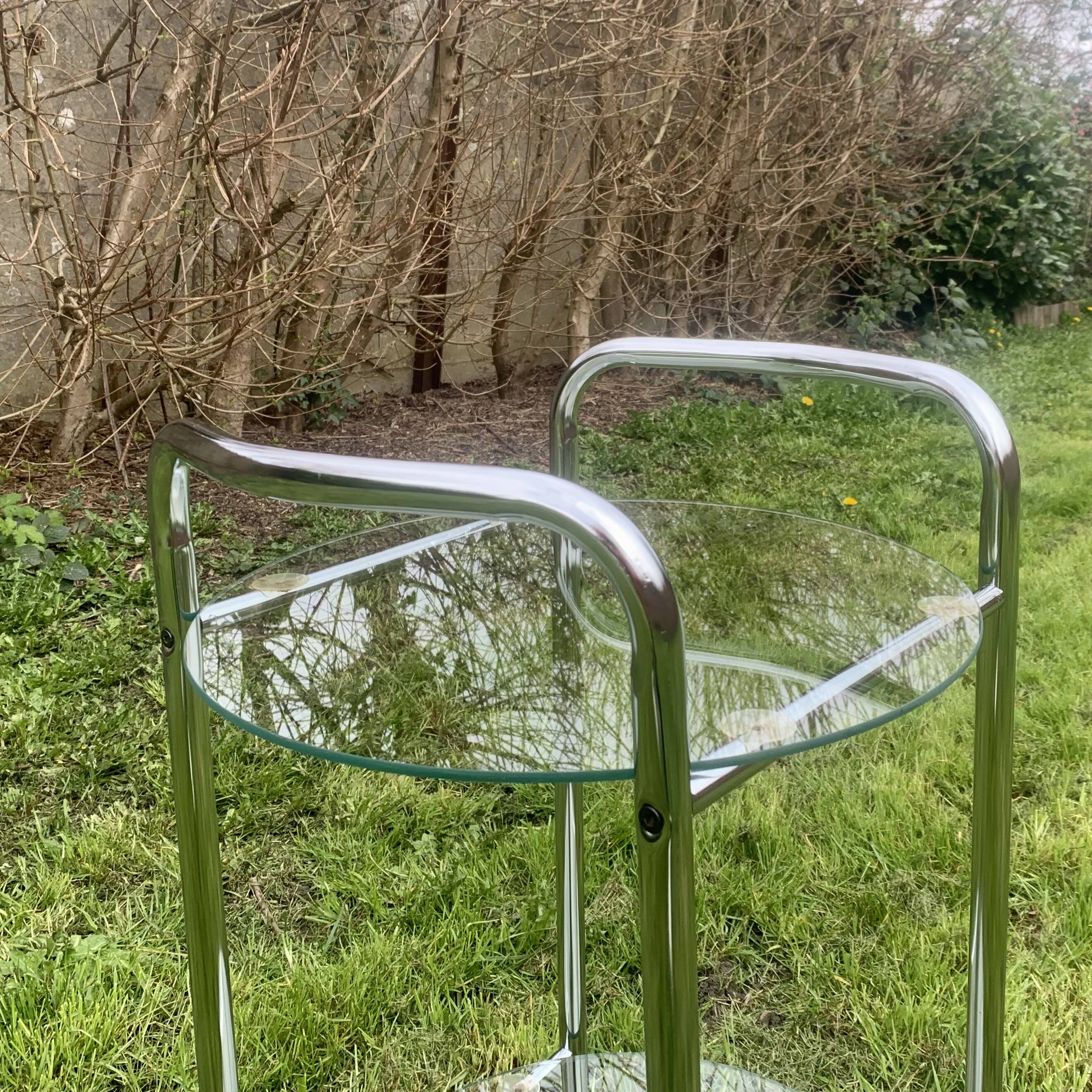 Pedestal table, vintage chrome steel saddle with 2 round windows