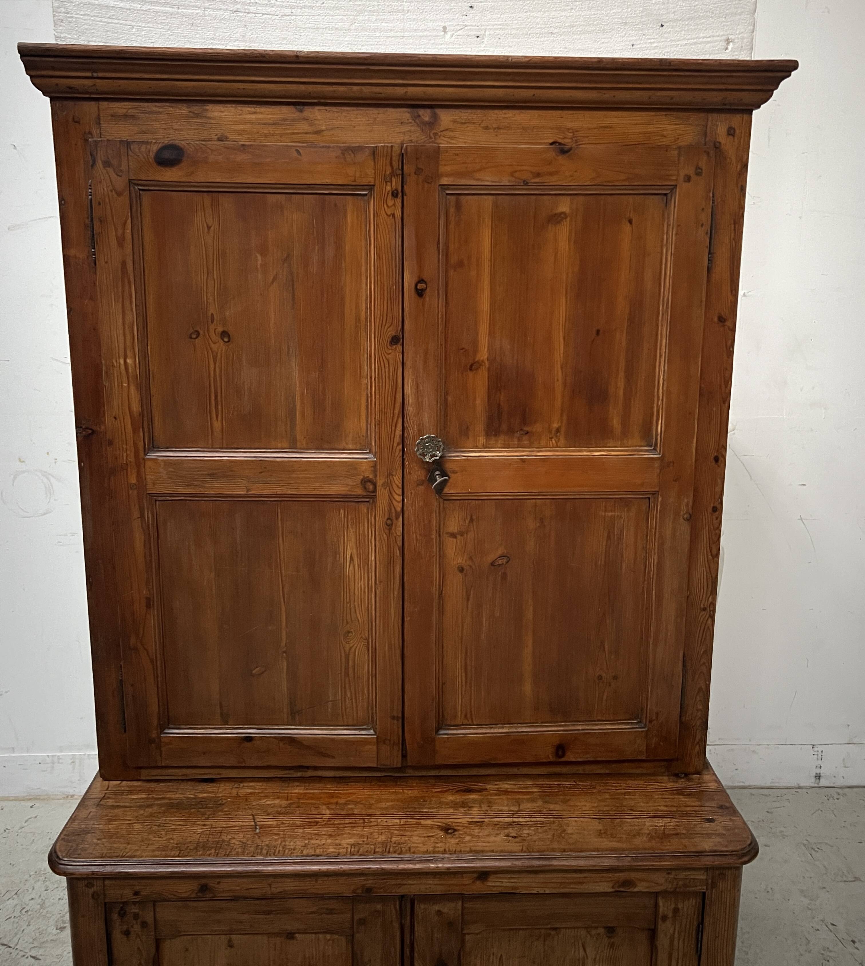 Two-part office furniture made of solid pine from the 20th century.