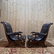 Paire de fauteuils anglais chesteefield en cuir noir
