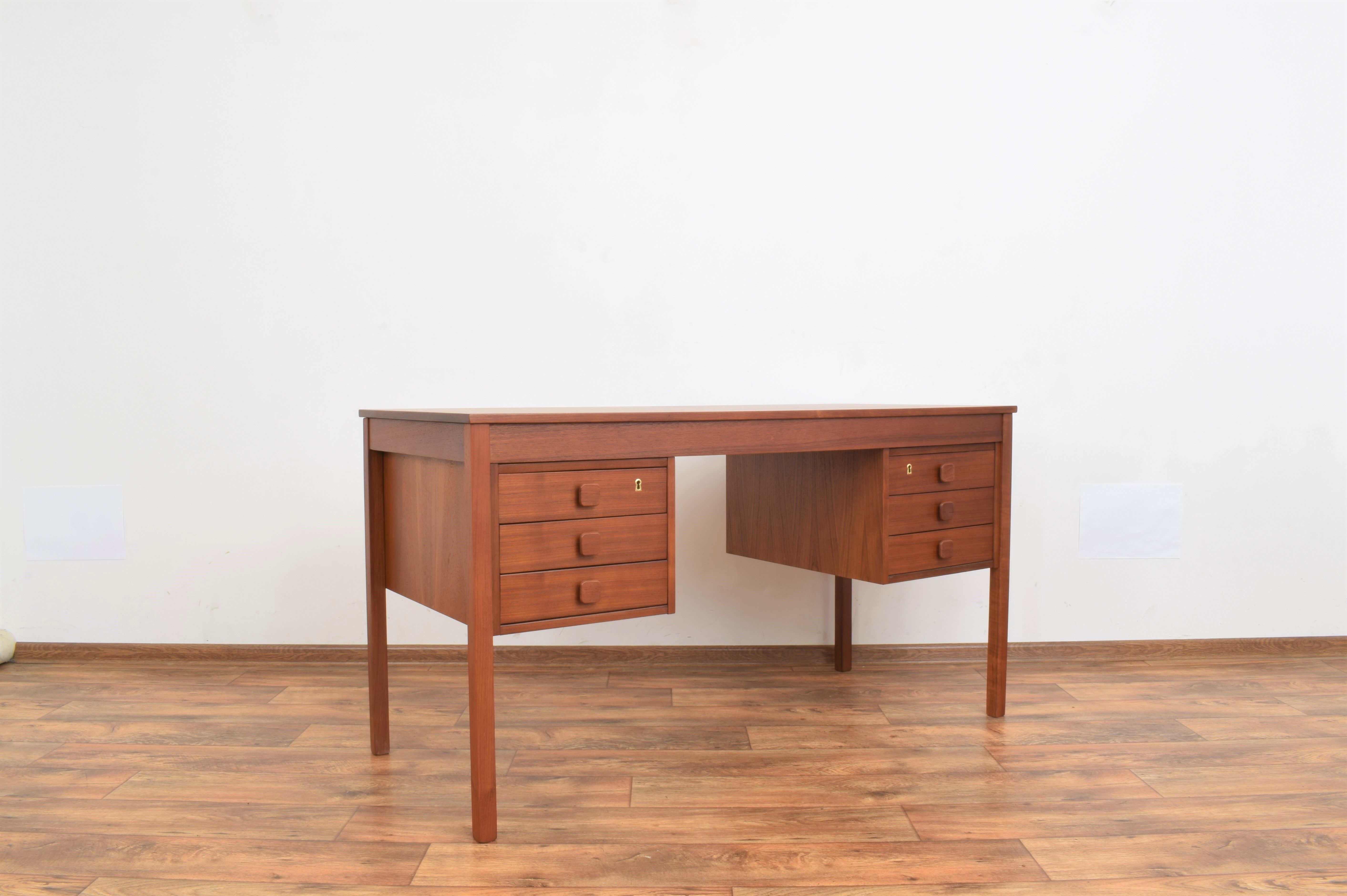 Teak desk and walnut armchair