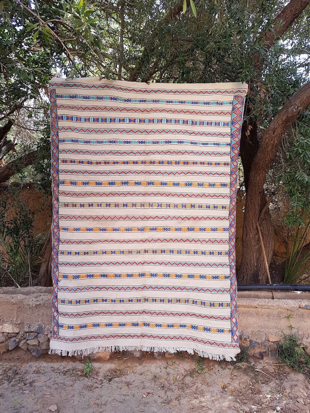 White carpet and woven wool, 185 x 250 colors