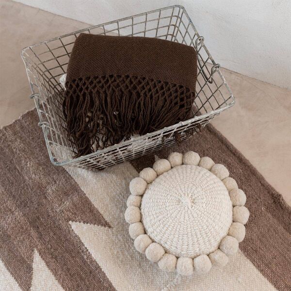 Mini coussin rond à pompons blanc en laine