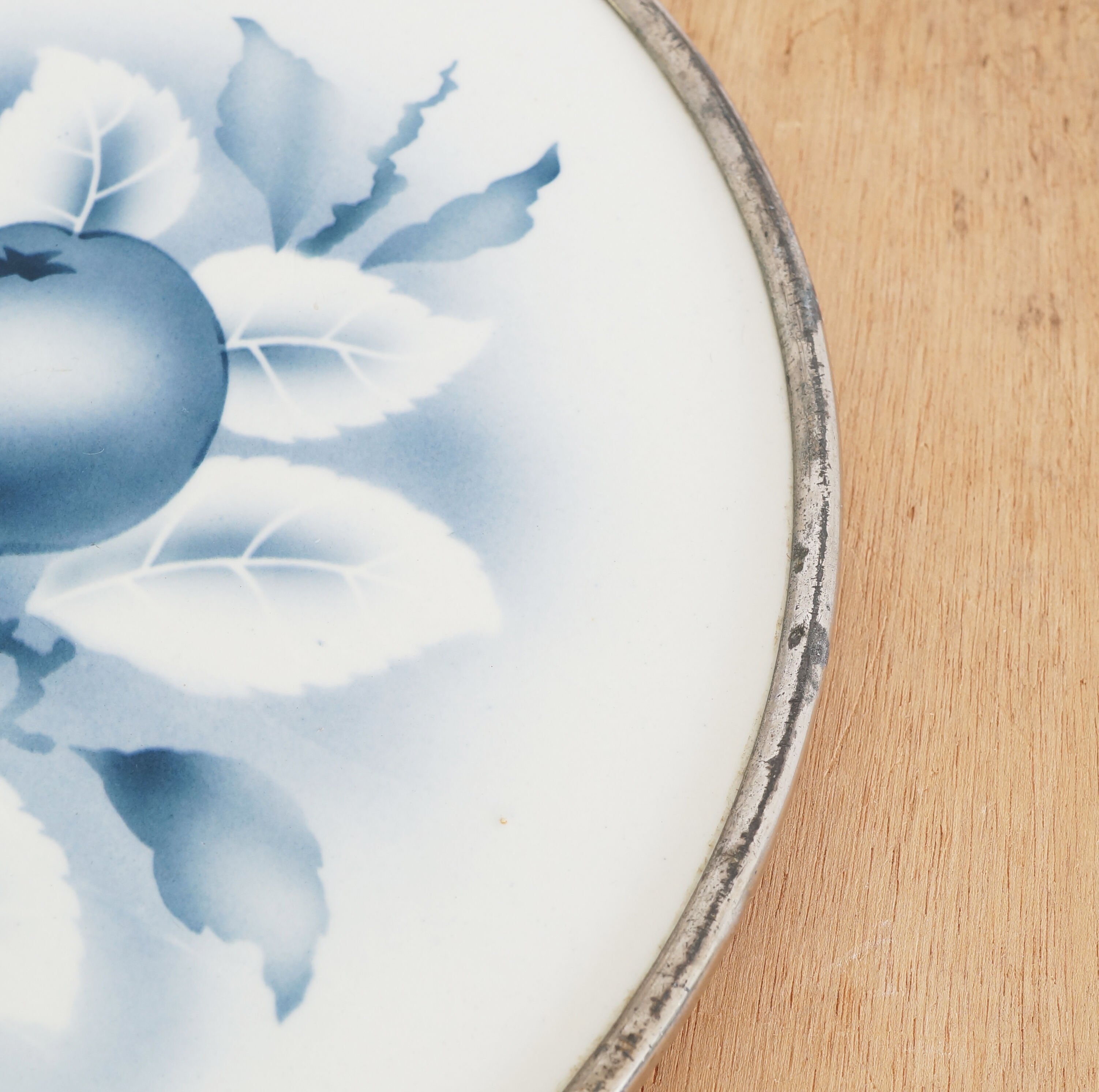 Round earthenware and metal trivets in the 30s or 40s