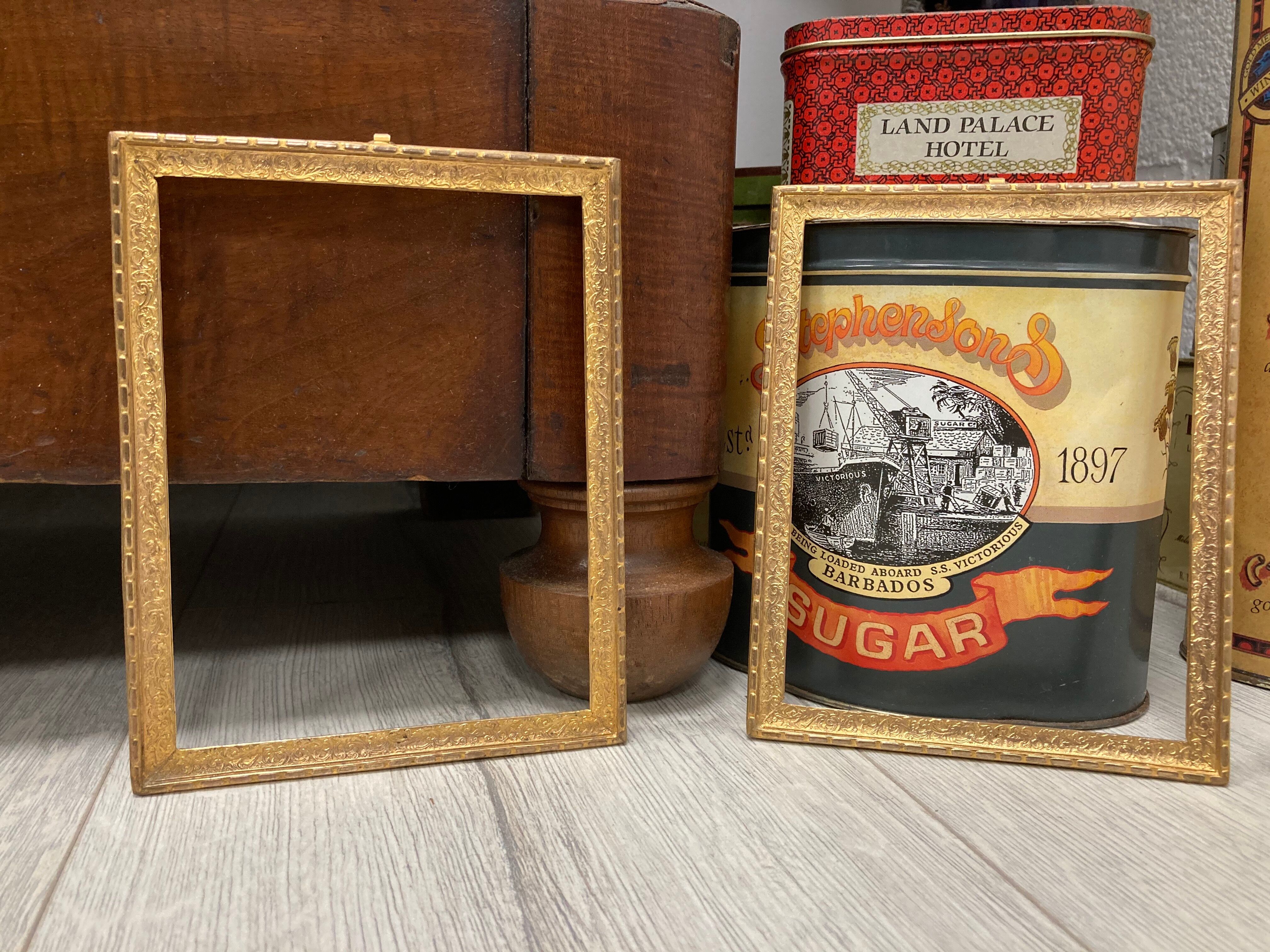 Pair of gold brass frames