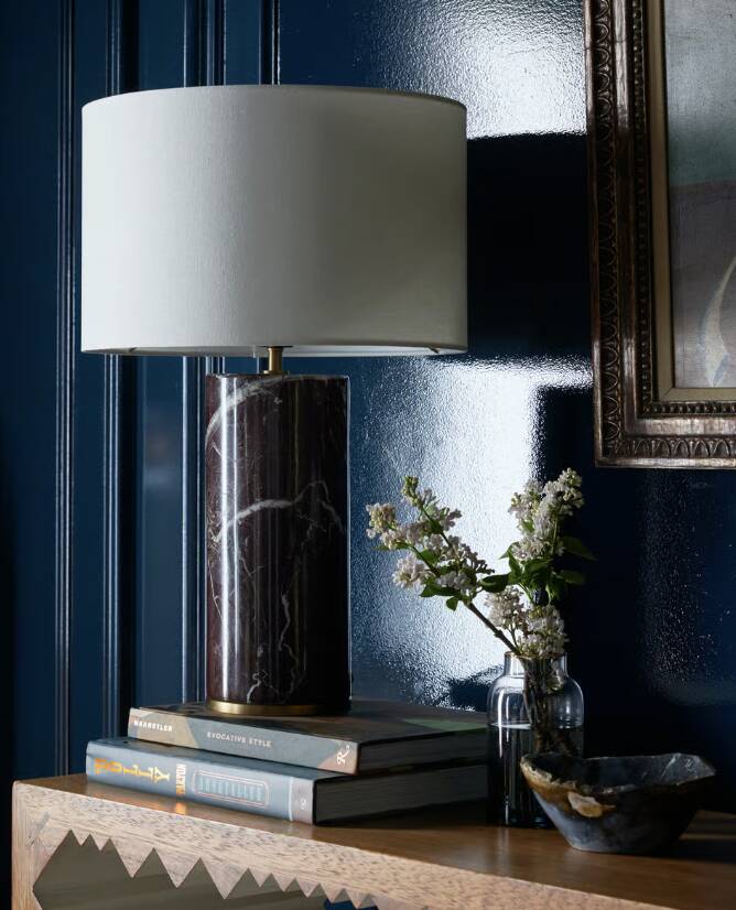 The Remi table lamp in red marble from Soho Home.