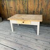 Raw wood and taupe coffee table