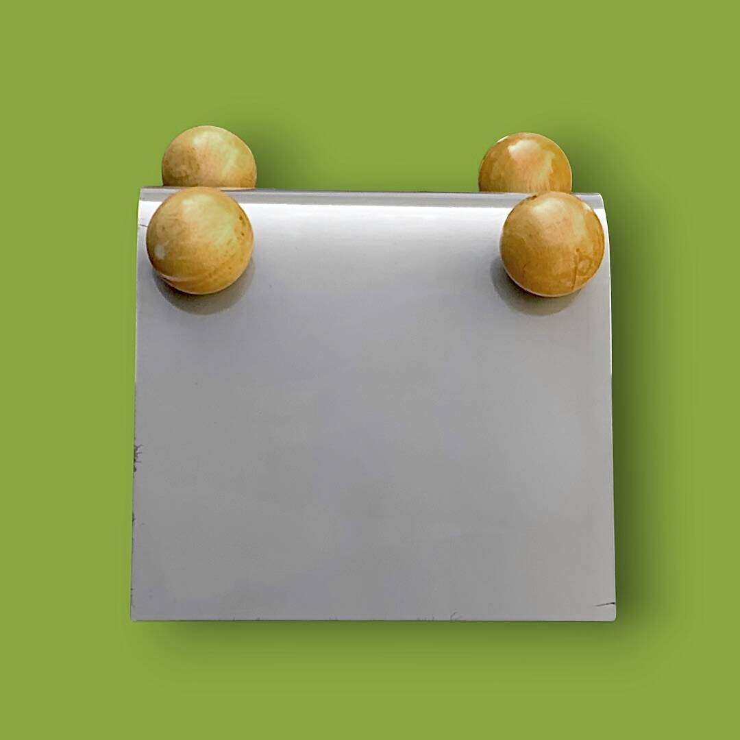 Vintage magazine rack in painted metal and wooden balls - minimalist design
