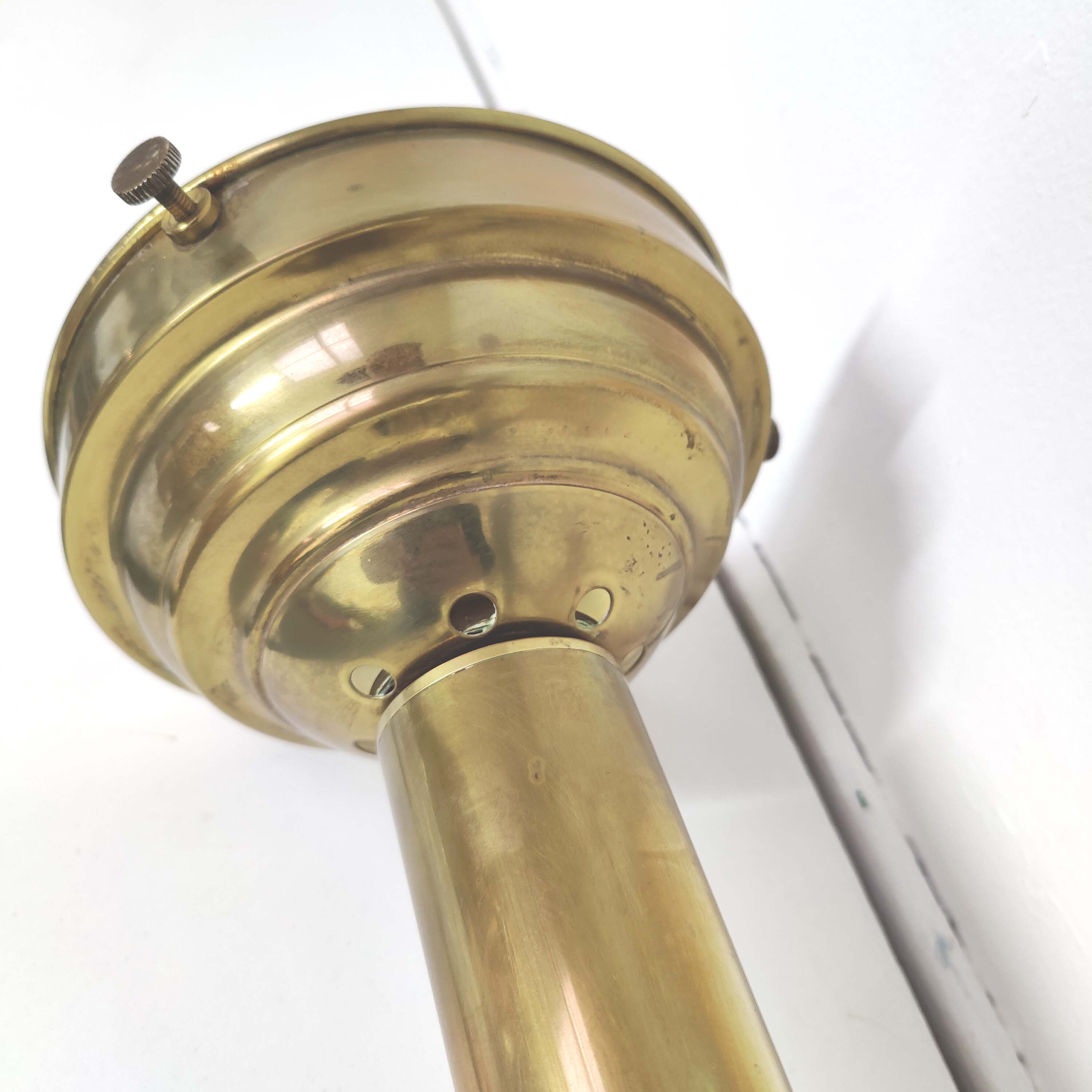 Brass brasserie floor lamp with opaline glass globe