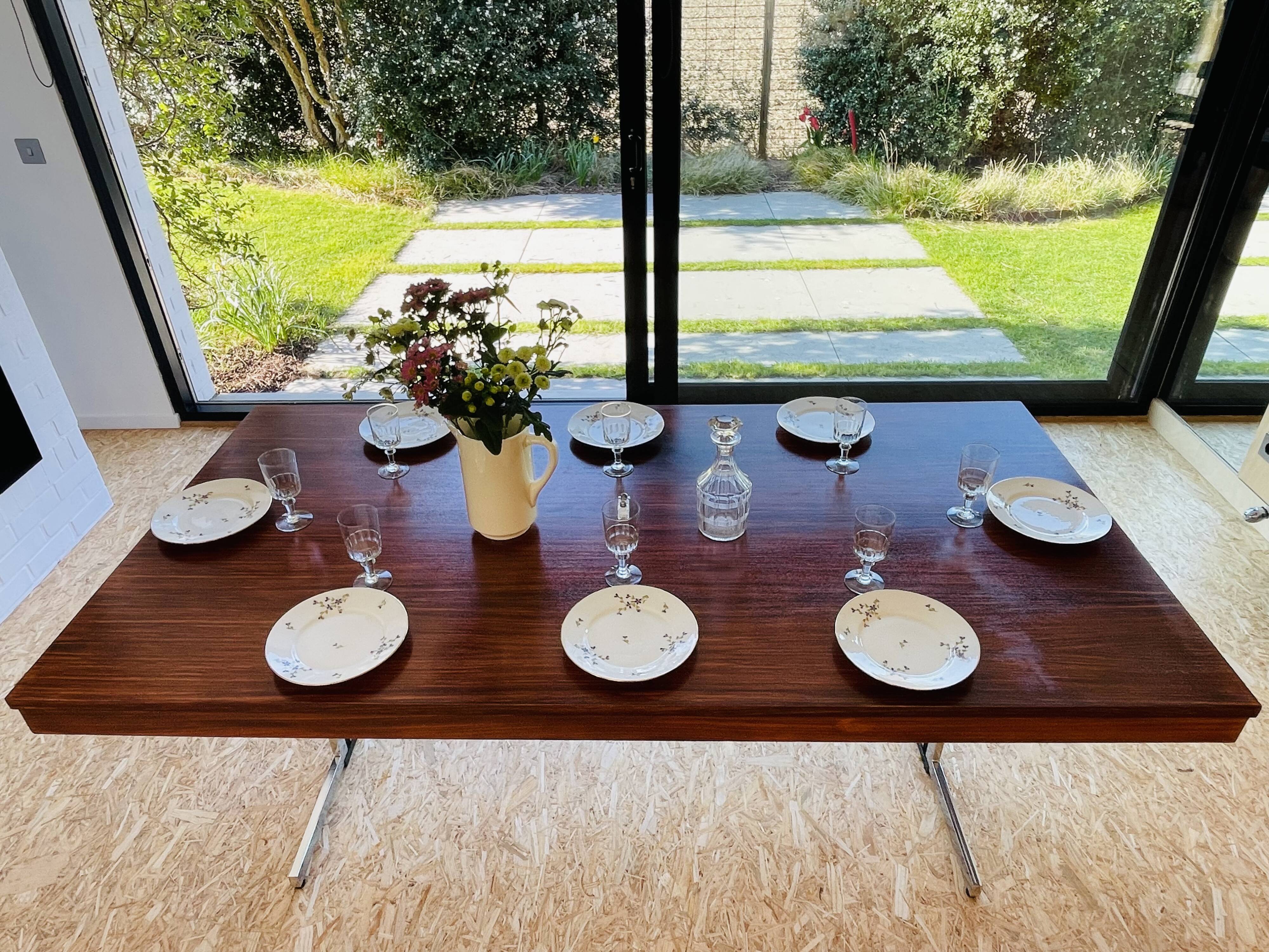 Desk that can serve as a dining table.