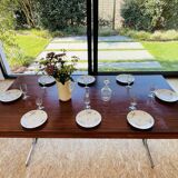 Desk that can serve as a dining table.