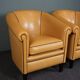 Set de 2 fauteuils club en cuir de mouton blond