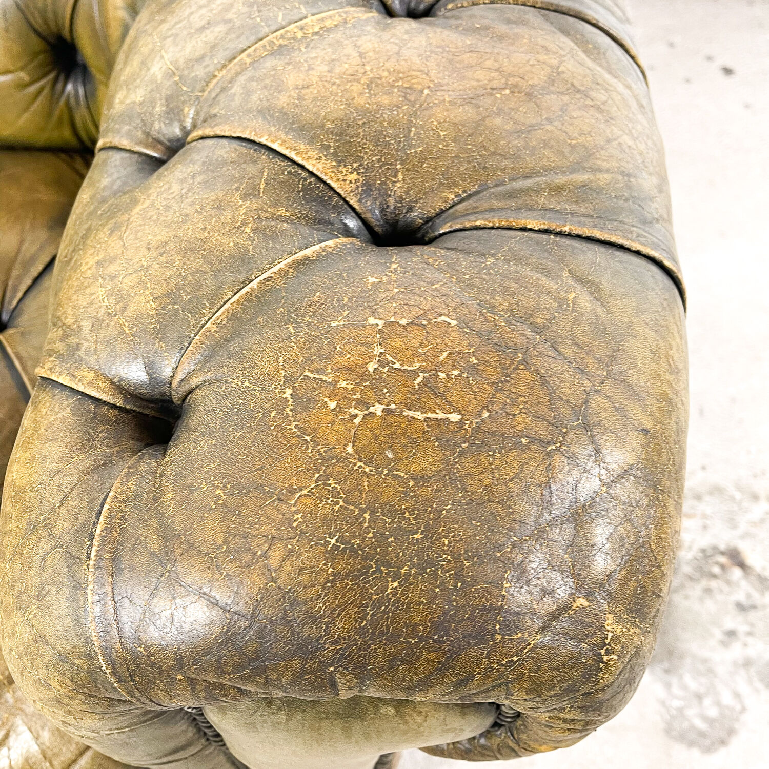 Old vintage leather chesterfield sofa