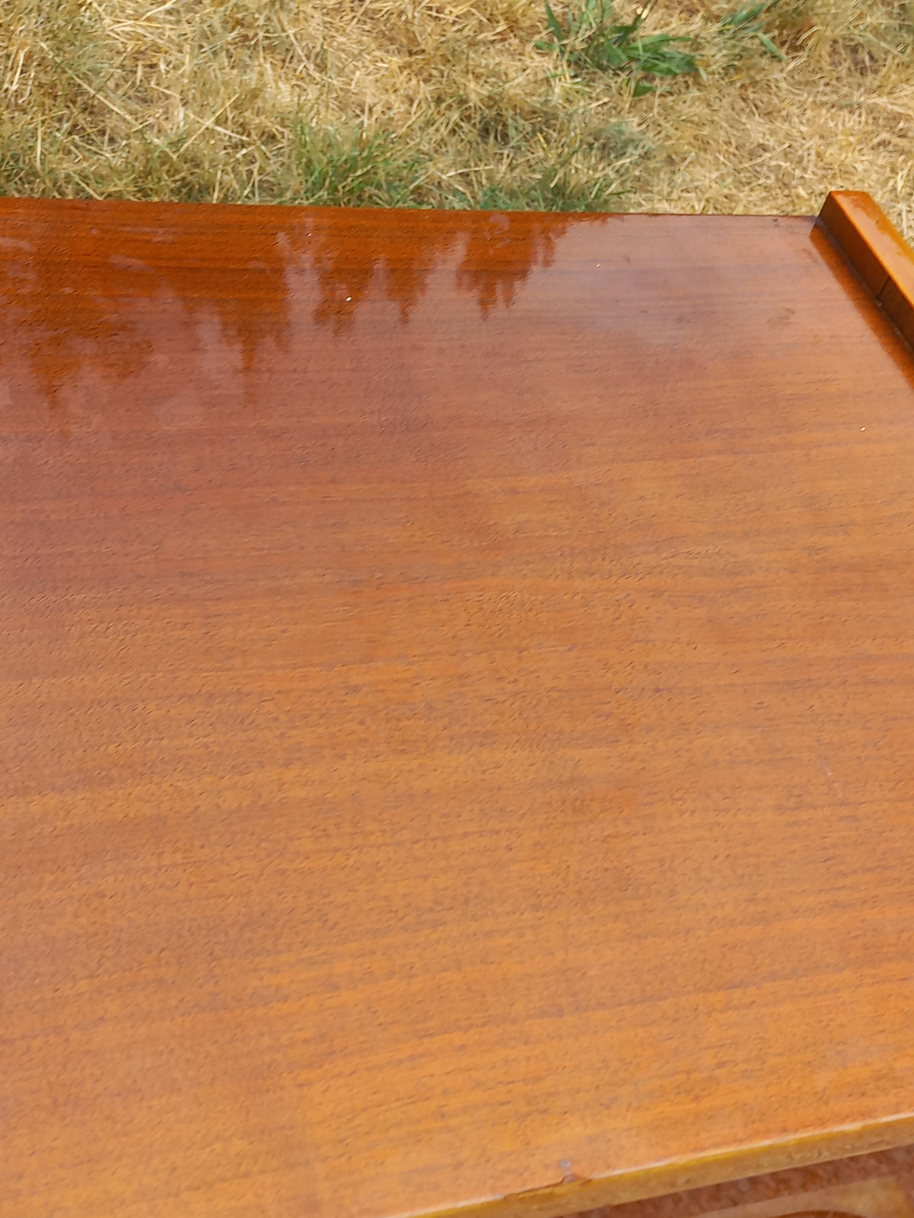 Vintage walnut varnished chest of drawers with 4 drawers from the 1960s.