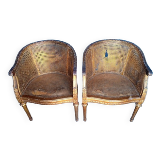 Paire fauteuils gondole style Louis XVI double cannage