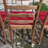 Round wooden table with 1 integrated extension + 6 wooden and fabric chairs