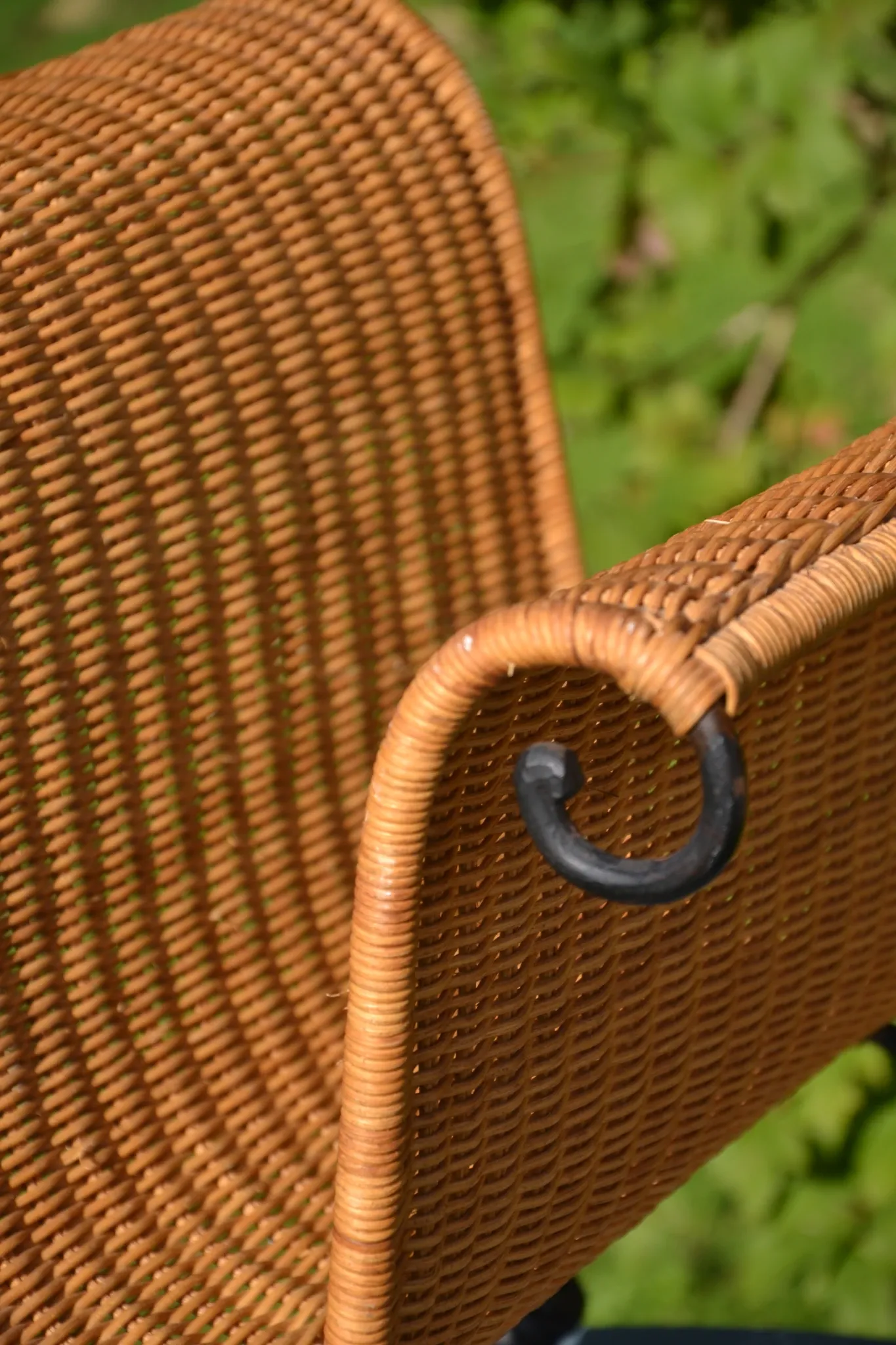 Wrought iron and rattan magazine/newspaper rack