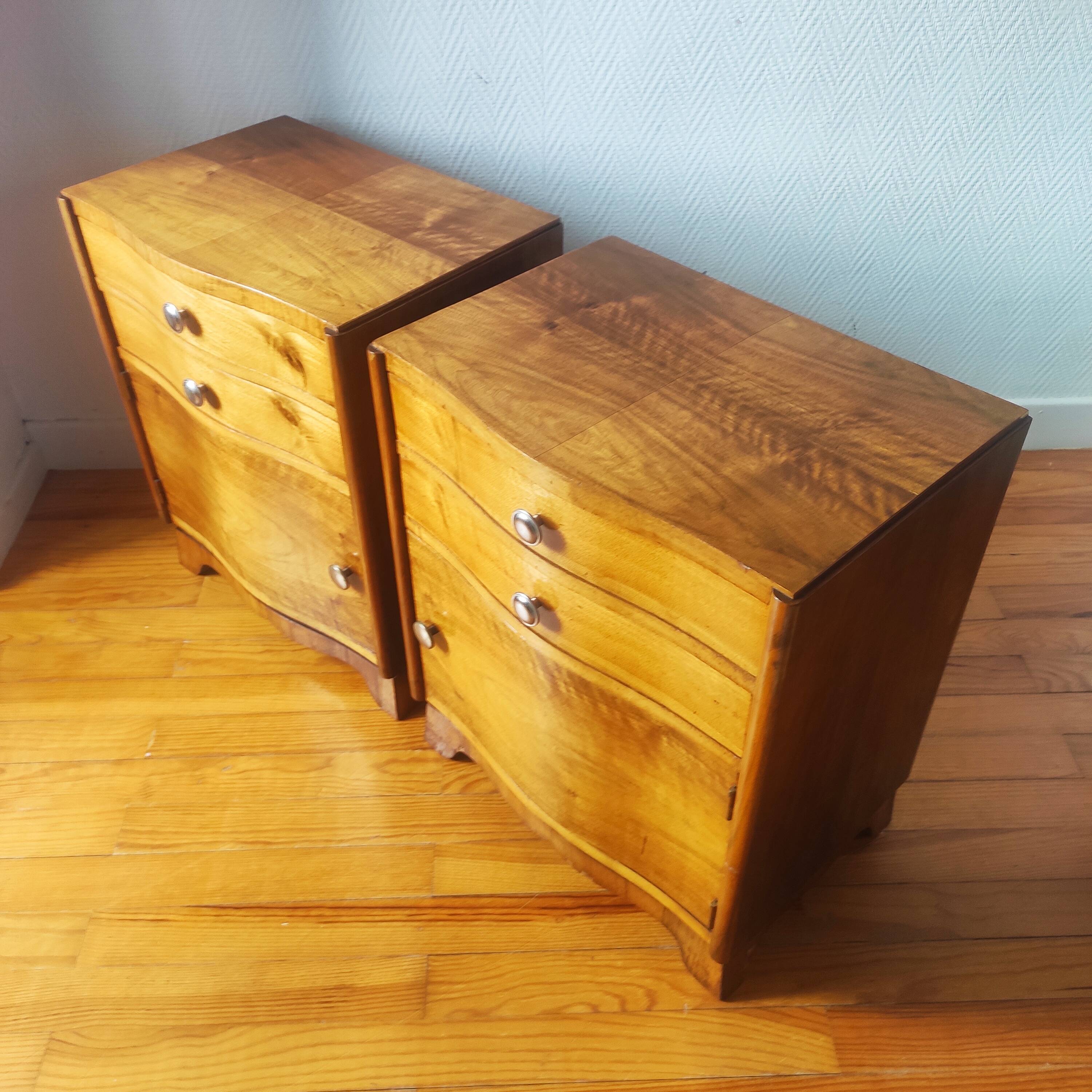 Pair of Art Deco curved bedside tables in light wood.