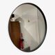 Round mirror 75cm in diameter with a black frame.