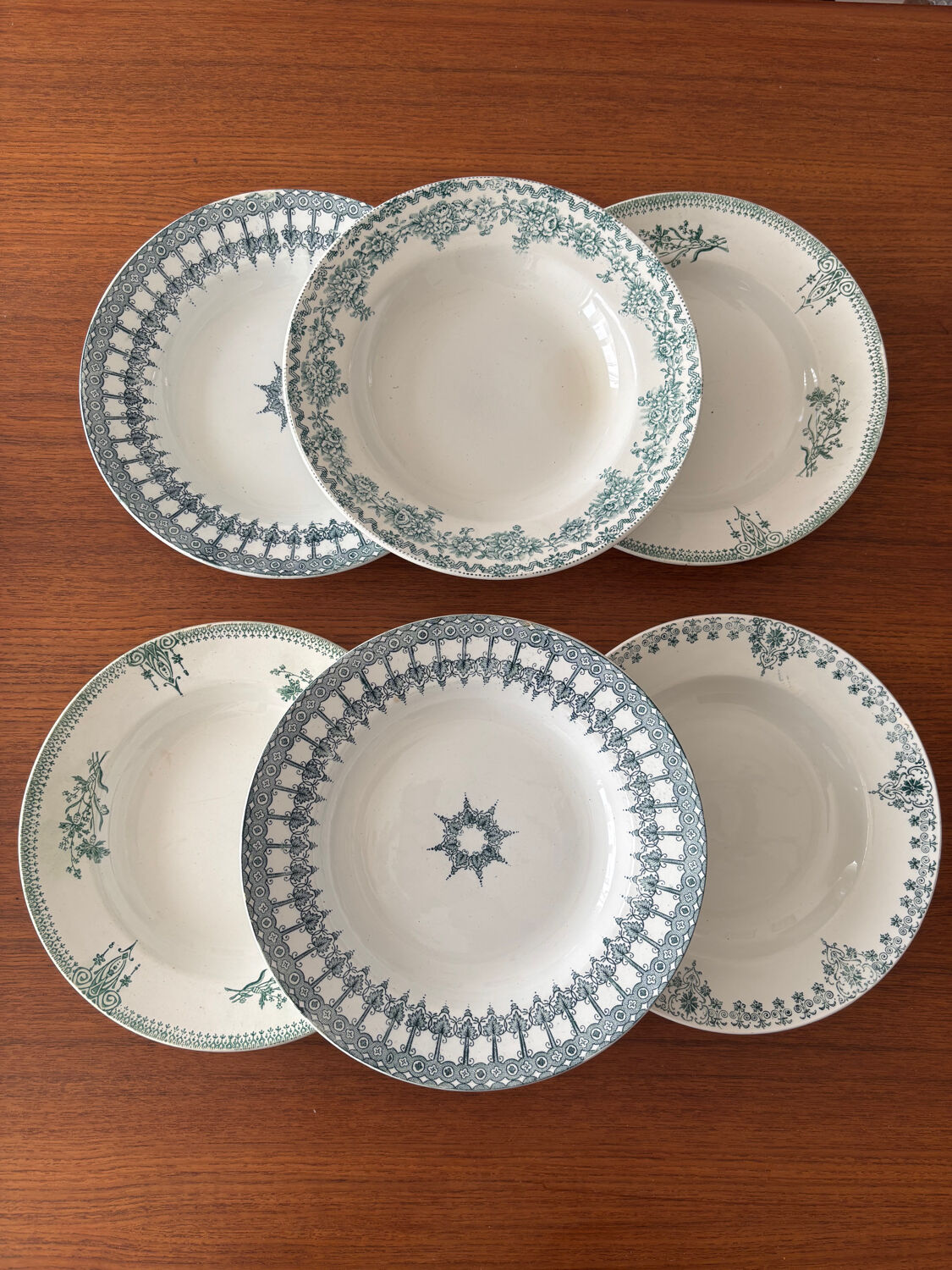 A deep plate in blue and green ironstone, antique French earthenware.
