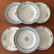 A deep plate in blue and green ironstone, antique French earthenware.
