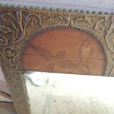 framed mirror with bird motif