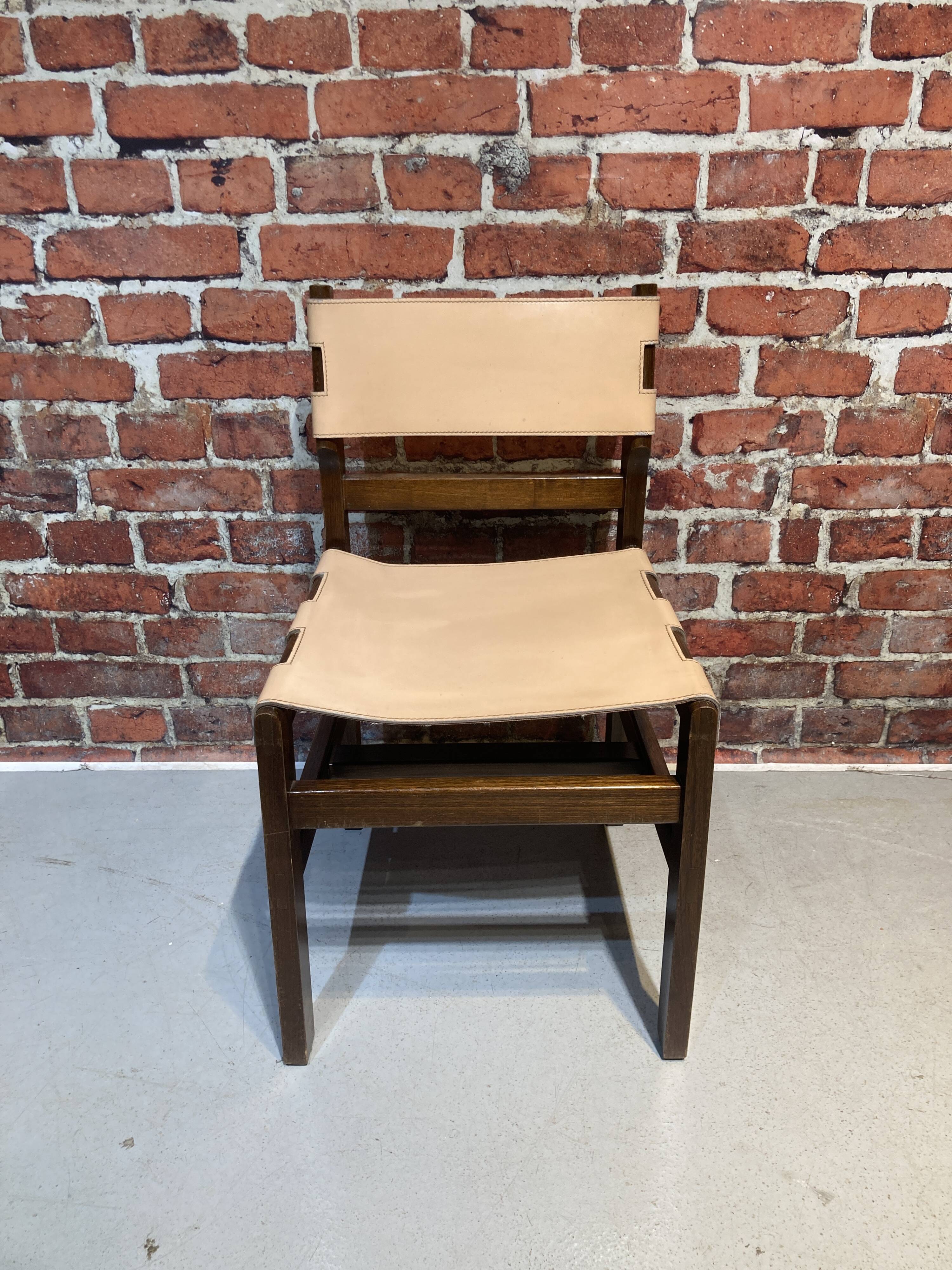 Set of four wooden and leather chairs from Maison Regain