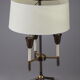 Lampe de table moderniste en métal laqué noir et doré