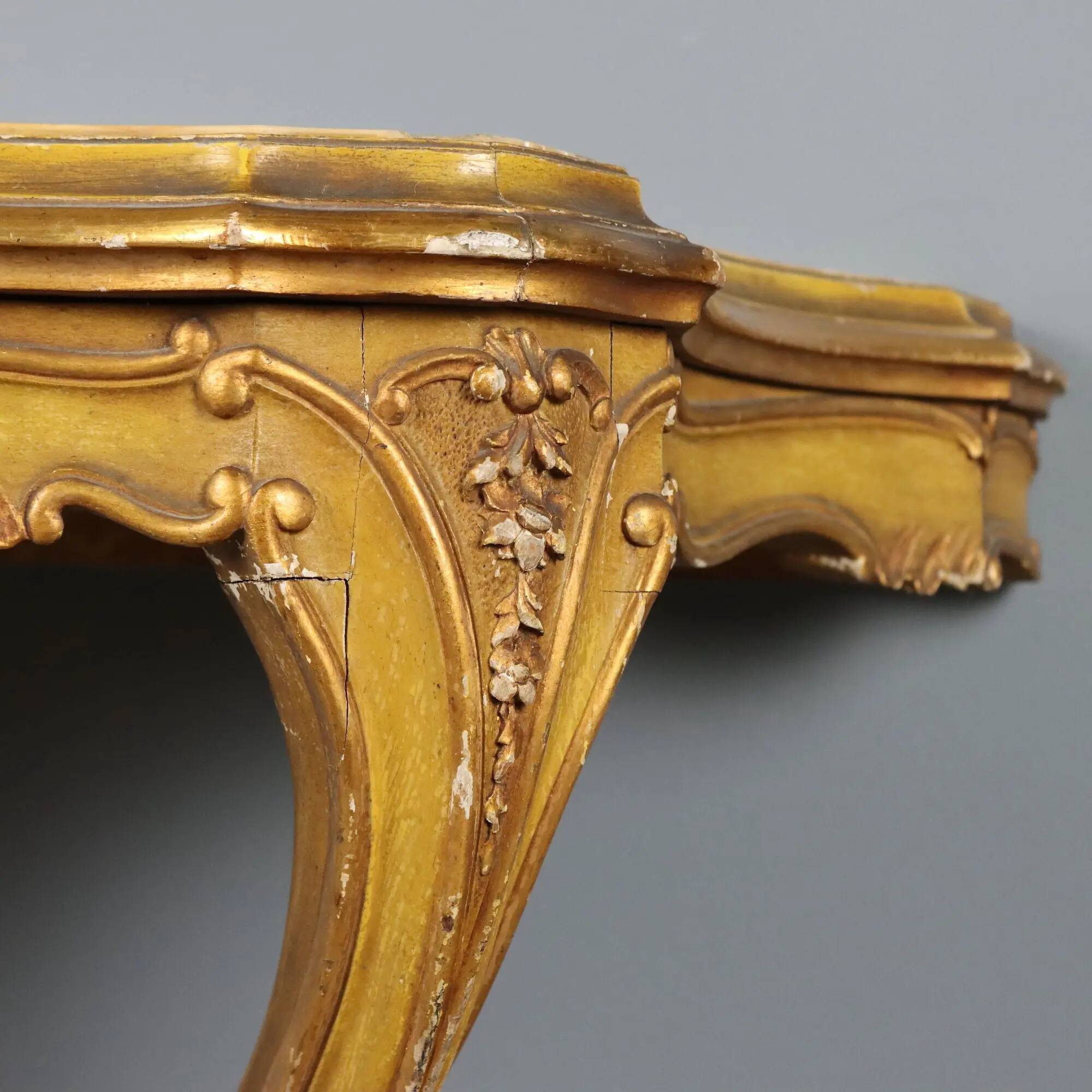 Antique console in carved gilded wood and marble, Italy, 19th century.