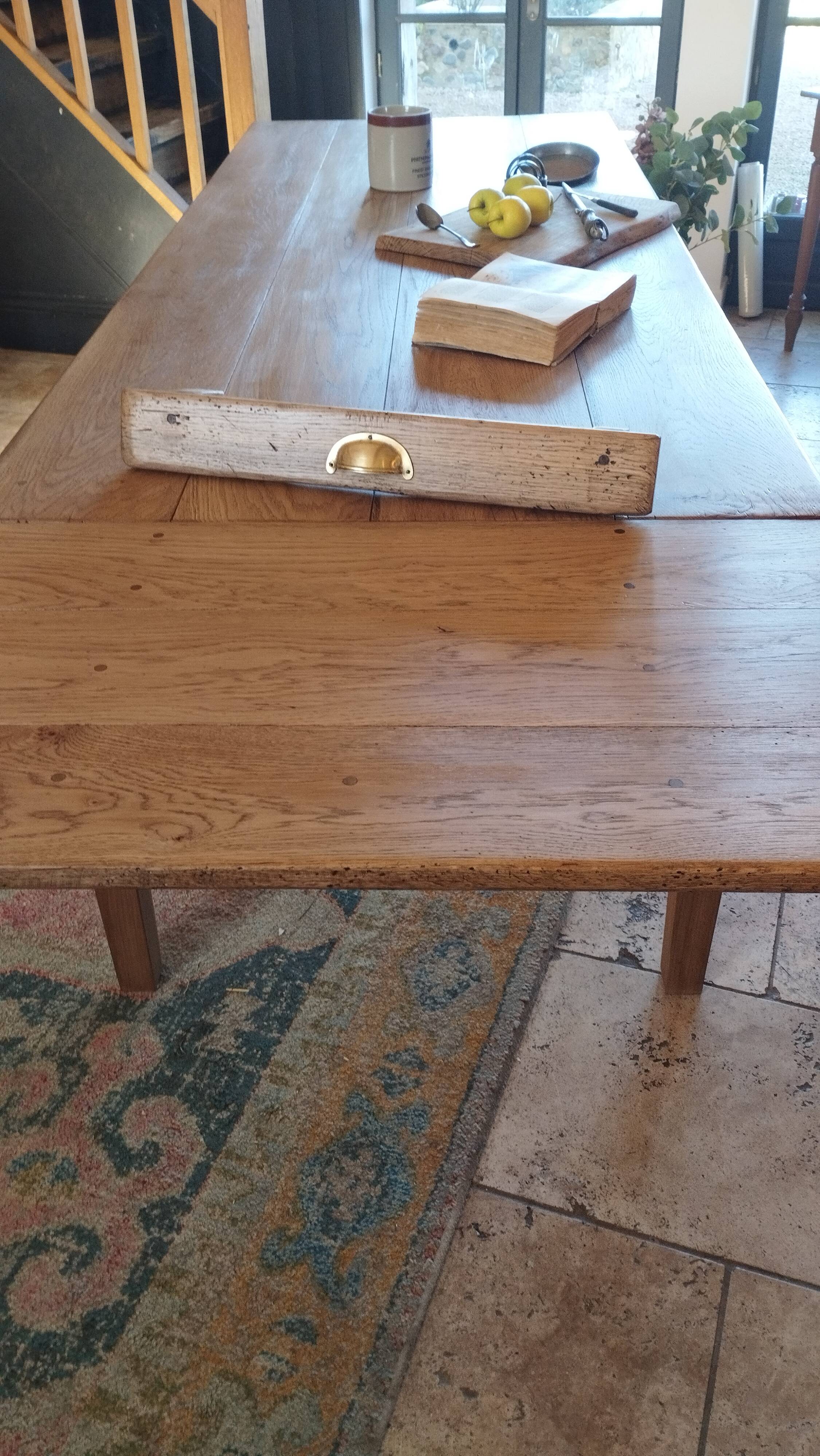 Solid oak farmhouse table with central drawer and extension