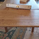 Solid oak farmhouse table with central drawer and extension